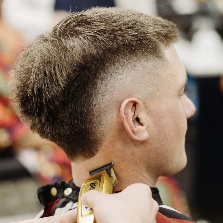 Skin fades and taper fades black woulf collctive barbers erina